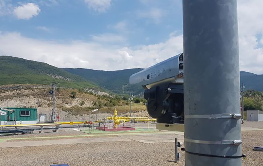 Surveillance camera for oil and gas safety monitoring in industrial sites.