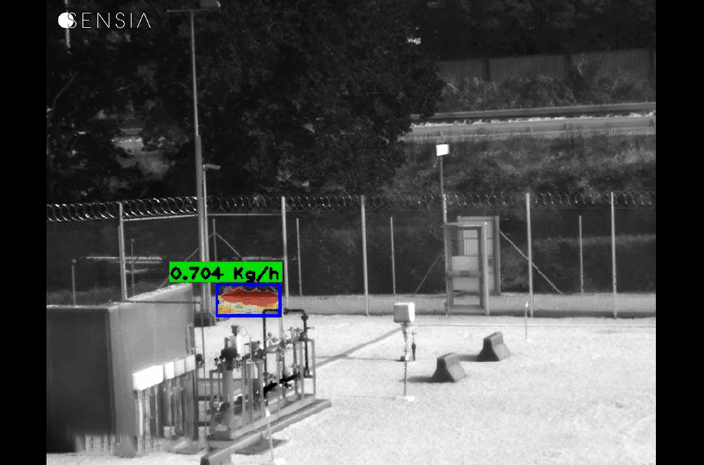 Gas leak detection system measuring leak rate in industrial area.